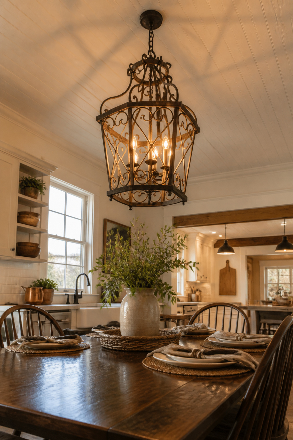 Farmhouse Kitchen Ceiling Lights: 6 Ideas for Every Style 2 A chandelier with rustic elements over a kitchen table.