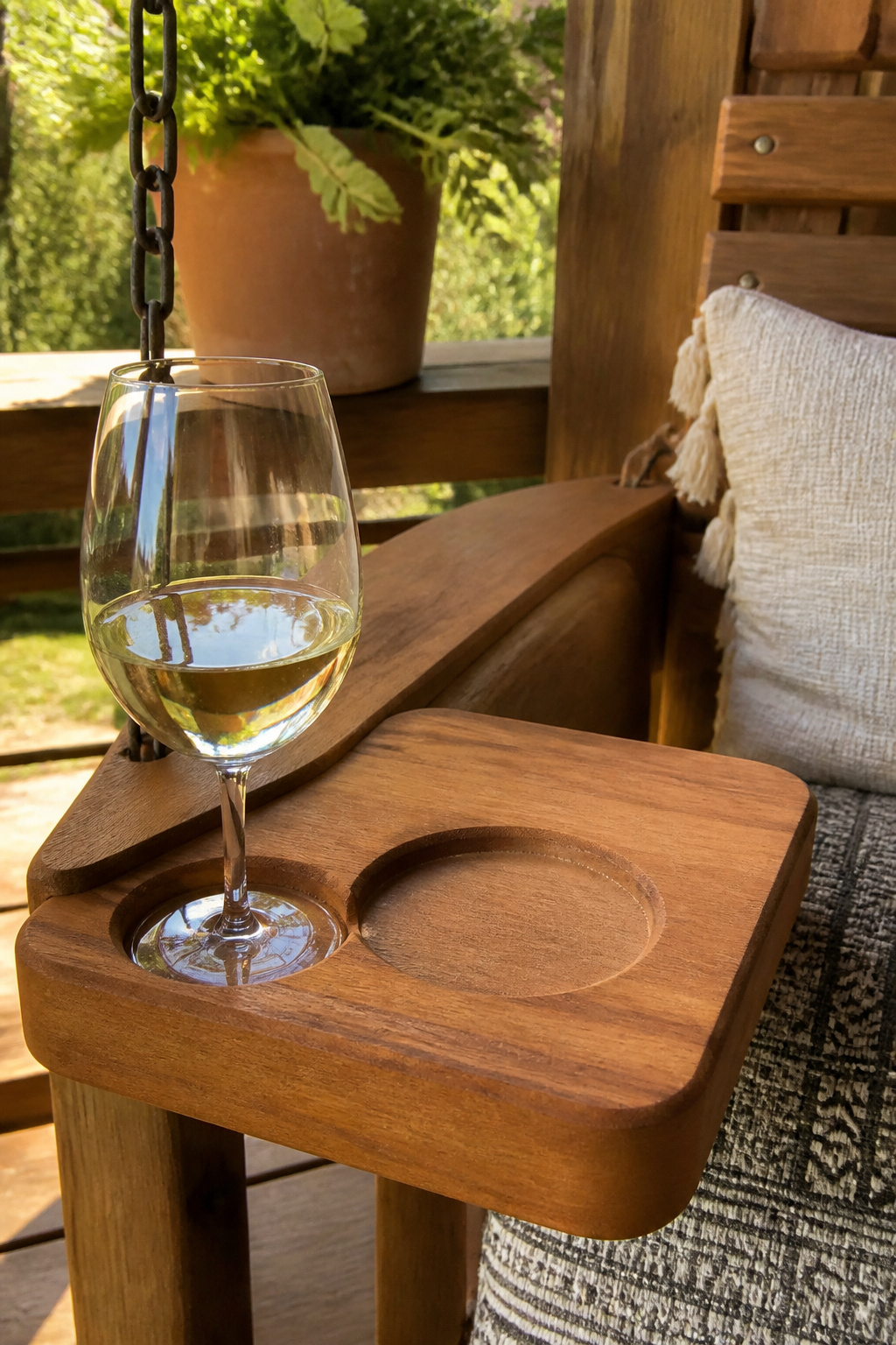 Eucalyptus Porch Swing Wine Glass Holder: Tray Table and Clamp Design 2 Close-up of the drink slot with a wine glass on the eucalyptus tray.