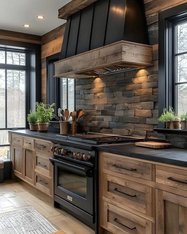 Rustic kitchen with wooden cabinetry, a stone backsplash, and a large black range hood over a stove.